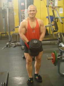 Building muscle, one rep at a time with relevant tools like a dumbell. In my Old School, no frills gym. Just the way I like it. 