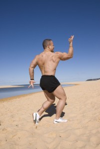 A variation of the 'back single biceps" pose ... on the beach. The combination of chaos + order = Life.